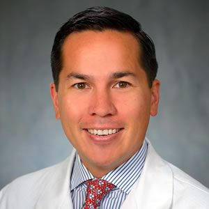 Dr. Alexander F. Au
