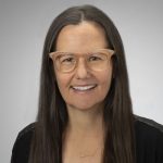Dr. Carolyn De La Cruz